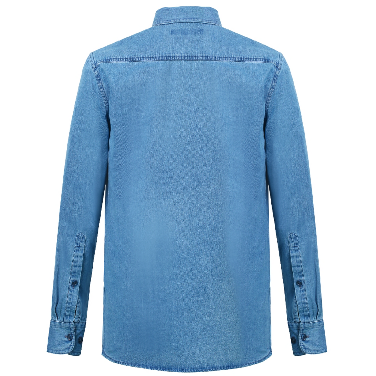 Back view of the Ritemate Denim Shirt, a long-sleeved, light blue piece made from 100% Cotton Denim. This shirt features buttoned chest pockets, a classic collar, buttoned cuffs, and a slightly curved hem. The fabric exhibits the typical texture of denim with visible stitching along the seams and shoulders.