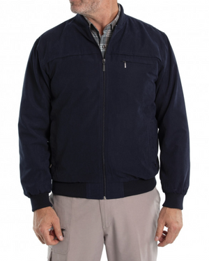 A person is styled in the Breakaway Microfibre Bomber Jacket, navy blue with a rib knit collar and full zip front, over a plaid shirt. It has side pockets and pairs well with beige pants. The person's face is unseen in the image.