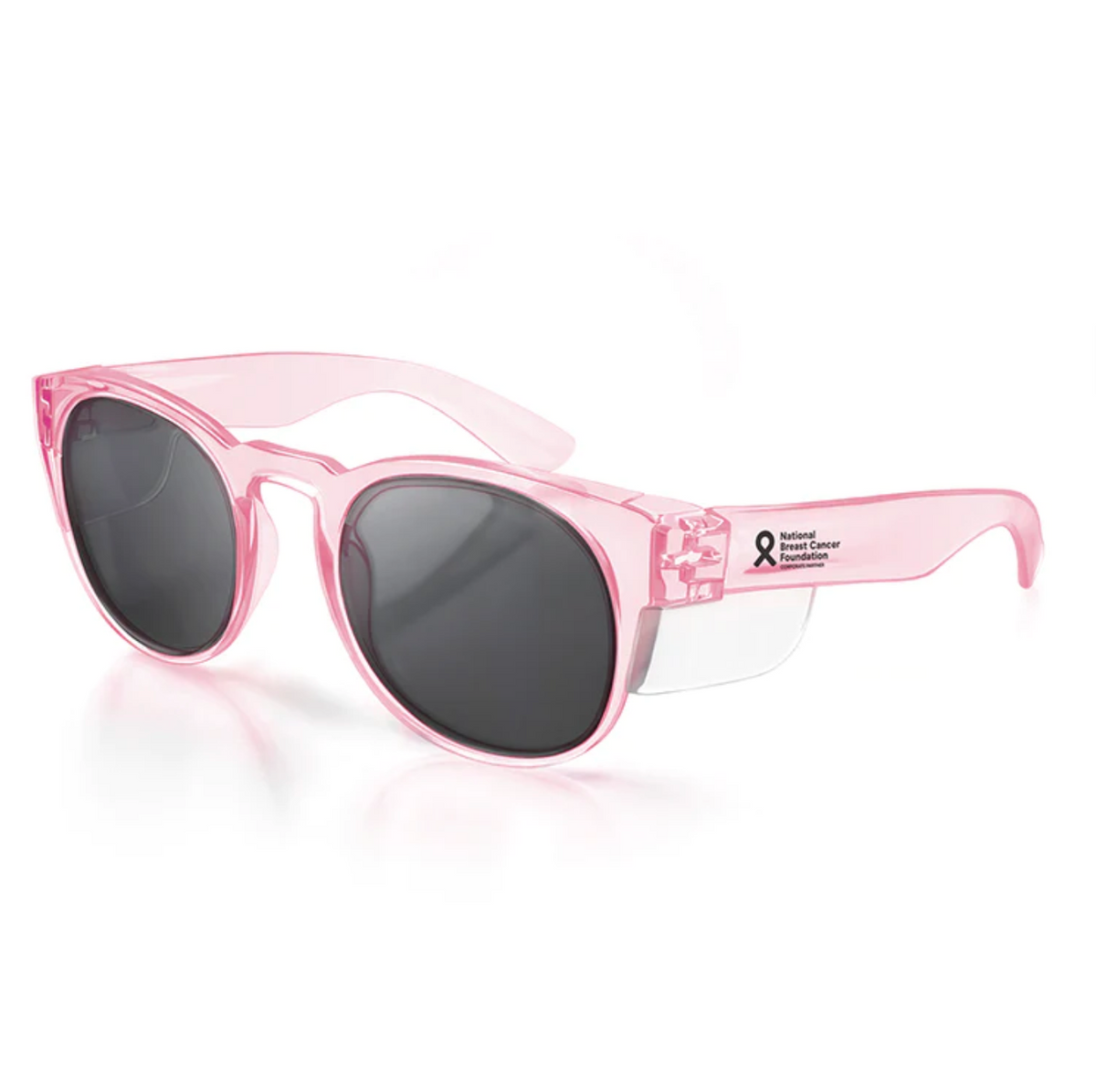 The SafeStyle Cruisers Pink Frame Polarised Lens sunglasses feature pink frames with dark lenses, side shields with UV400 protection, and temples adorned with a breast cancer awareness ribbon and "National Breast Cancer Foundation" text, combining style and purpose.