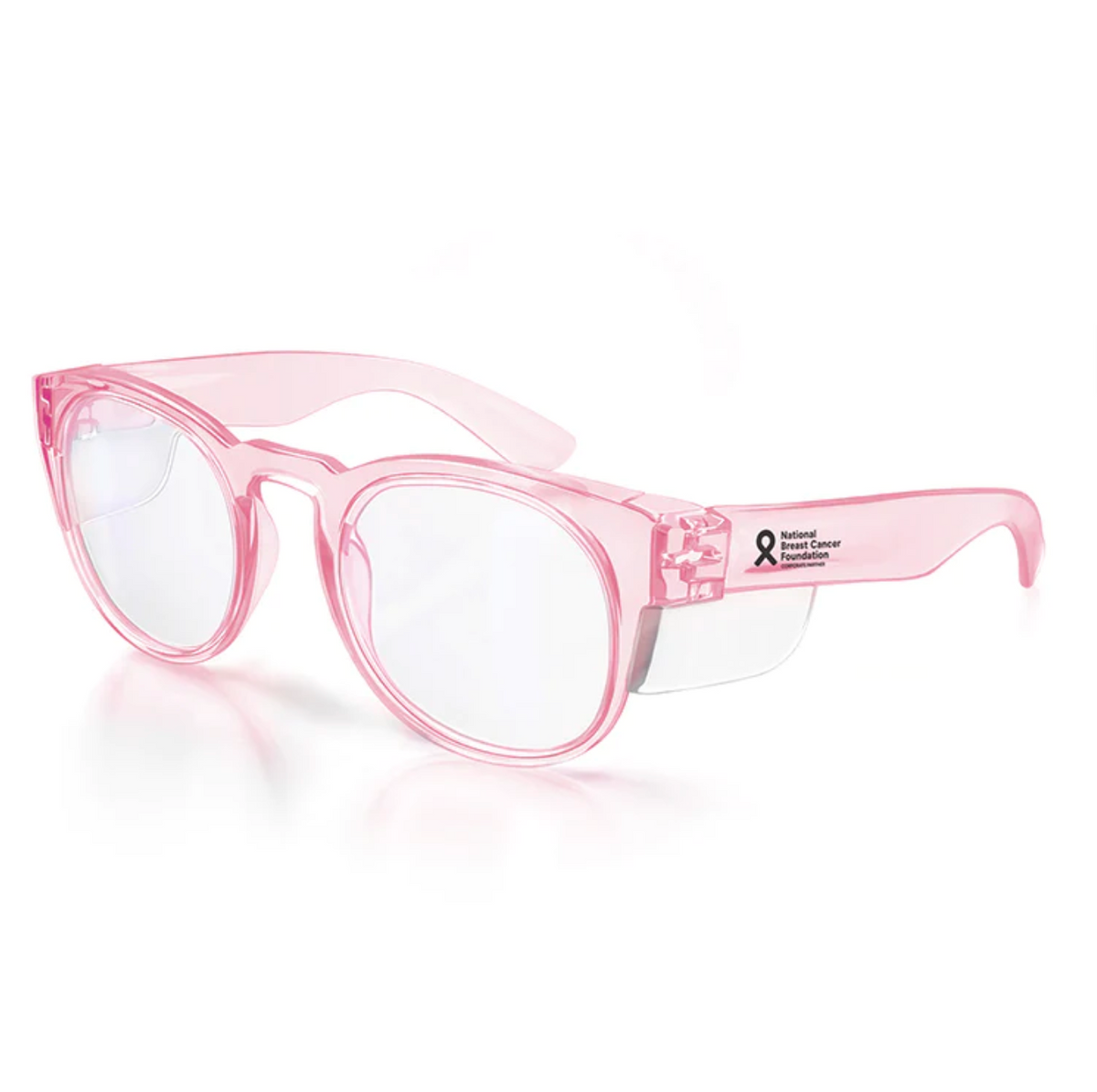 SafeStyle Cruisers women's safety glasses have pink frames, clear UV-protection lenses, and feature a small black ribbon symbol plus the phrase "National Breast Cancer Foundation" near the temple.