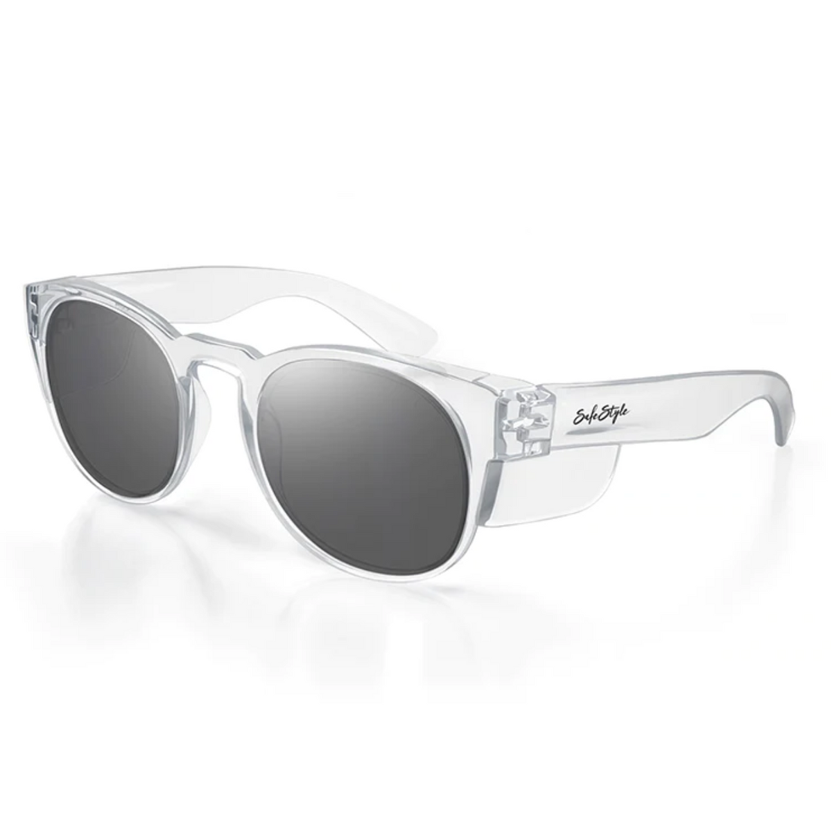 SafeStyle Cruisers Clear Frame Tinted Lens sunglasses elegantly rest on a white surface, showcasing a black cursive logo on the temple arm while offering optimal UV protection.