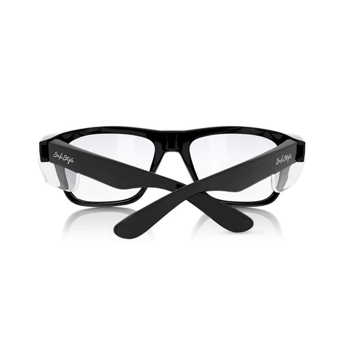 The partially folded SafeStyle Fusions with black rectangular frames and clear lenses are displayed on a white background. "Eye Style" is elegantly inscribed on the temples, offering UV protection for a practical and chic look.