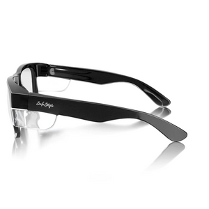 The SafeStyle Fusions feature sleek black frames with glossy sides, clear UV-protected lenses, and "Style Style" inscribed in white on the arms. They are elegantly presented against a plain white background.