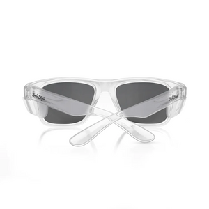 SafeStyle Fusions feature sleek clear frames with tinted lenses that offer UV400 protection. From the back, crossed arms reveal the brand subtly on the inside left arm of their polycarbonate build.