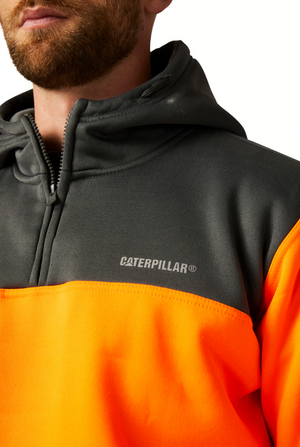 A close-up shows a person wearing the CAT Hi Vis Hoodie in black and bright orange, featuring the Caterpillar logo on the chest. Only their lower face, neck, and upper chest are visible. The hoodie is known for rugged dependability.