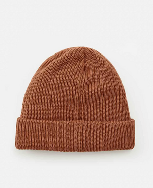 The Rip Curl Icons Reg Beanie, a brown knitted hat with a cozy fleece lining and folded brim, is displayed against a plain white background.