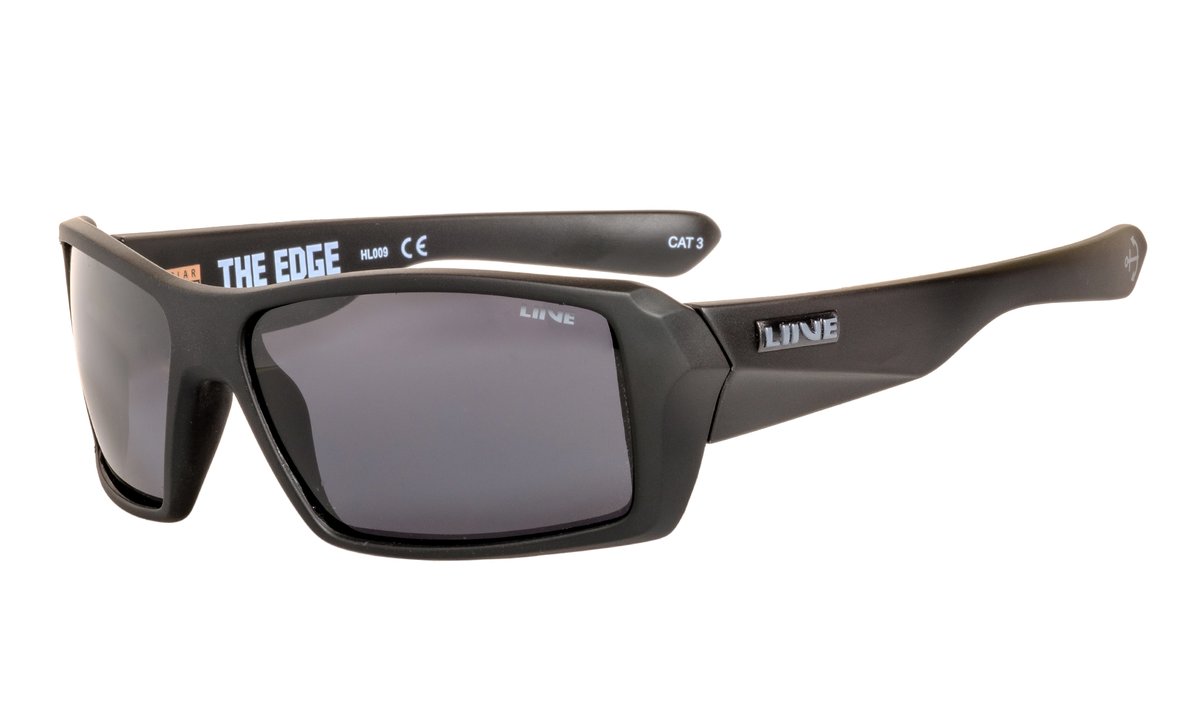 The Liive The Edge Polar Float Sunglasses feature a black wraparound design with polarized grey lenses and thick frames. The brand name "LIVVE" is prominently displayed on the temples in a silver font, while the inside of the right temple bears the text "THE EDGE" alongside certification markings for UV protection.