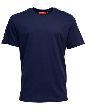 The Hard Yakka Crew Neck T-Shirt is a plain navy blue short-sleeve tee with a classic crew neckline, crafted from 100% cotton. It features a small red tag on the inside of the neck and an additional small red label on the left sleeve, providing soft and comfortable fabric perfect for everyday wear.