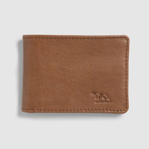 The Rodd & Gunn Victoria Flats Road Wallet is a smooth-textured, light brown buffalo leather wallet with visible stitching. It features a small embossed animal logo on the bottom right corner and has multiple card slots, set against a neutral background.
