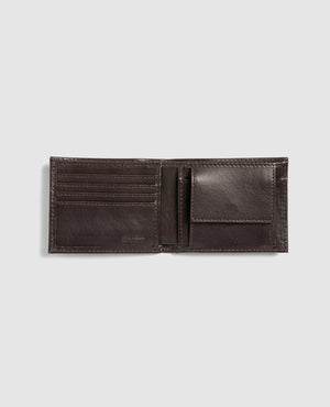 The Rodd & Gunn Leeston Dunsandel Road Wallet is shown open on a white background, displaying multiple card slots on the left and a coin pocket with snap closure on the right.