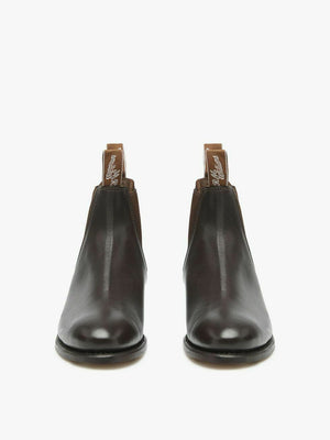 The RM Williams Adelaide Kangaroo Boot is a pair of dark brown kangaroo leather Chelsea boots with pull tabs, shown from the front against a plain white background.