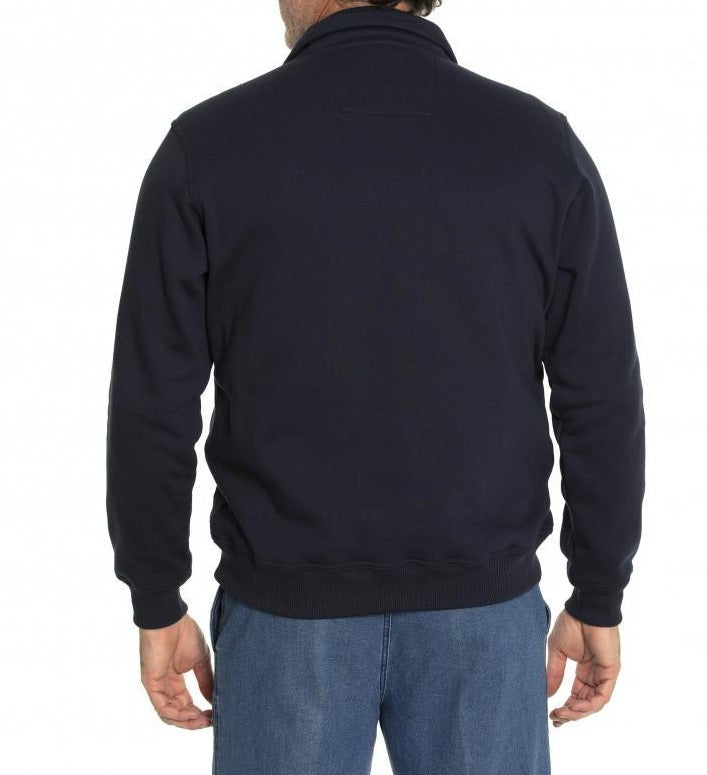 A man is shown from the back wearing the Breakaway Narcise Snowy Mt Fleece, a navy blue jacket with a rib knit collar. He pairs it with blue jeans and stands with his hands hanging by his sides against a plain white background.