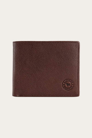 The Ringers Western Bayview Wallet, made of genuine leather with a textured finish and circular embossed logo at the bottom right, is displayed on a light background. This accessory adds sophistication to your essentials.