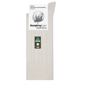 Displayed is a single beige Humphrey Law Pure Cotton Sock, featuring a packaging card with a cotton illustration. The card details the sock's attributes ("lightweight breathable socks," "medium size") and includes a green triangle logo with a stylized sun image.