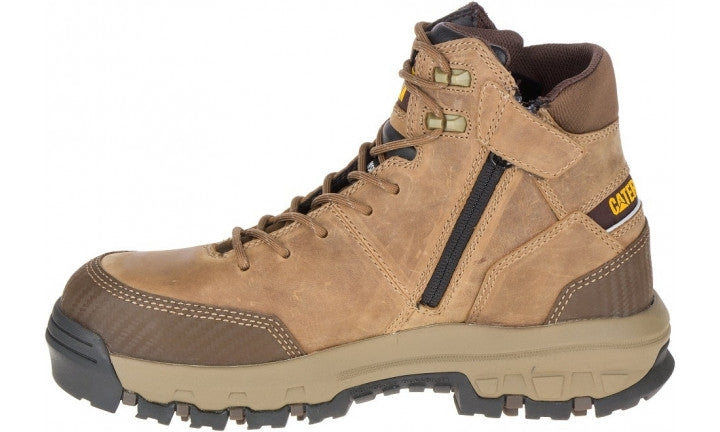 The CAT Device Zip WP CT is a brown leather hiking boot featuring black laces, metal eyelets, and a convenient side zipper. It boasts a rugged, thick rubber sole for superior traction and durability, as well as a composite toe for added safety. The boot is slip-resistant and includes a small yellow and black tag with unreadable text near the ankle area.