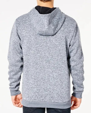 A person is seen from the back wearing a Rip Curl Anti Series Crescent Hood in light gray with a speckled texture, paired with dark pants. The hoodie combines style and durability effortlessly against a plain white background.