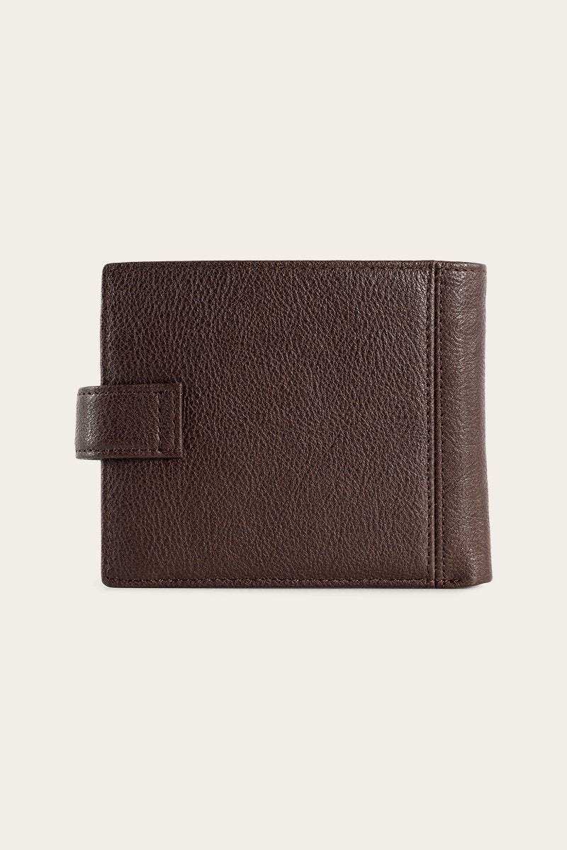 A Ringers Western Cypress Wallet made of genuine leather, with a textured surface and strap for fastening, displayed against a plain light background.