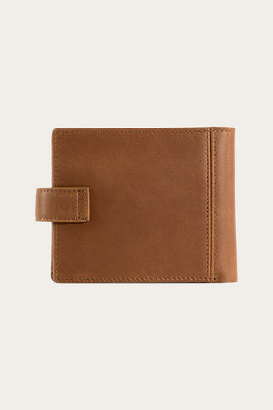The Ringers Western Cypress Wallet, crafted from genuine leather, features a classic strap closure and is elegantly displayed against a plain light background.