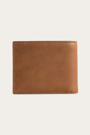 A brown Ringers Western Duke Wallet, made from genuine leather, rests closed against a light gray background. It highlights its smooth texture and minimalist design, appearing new and well-crafted without visible logos or embellishments.