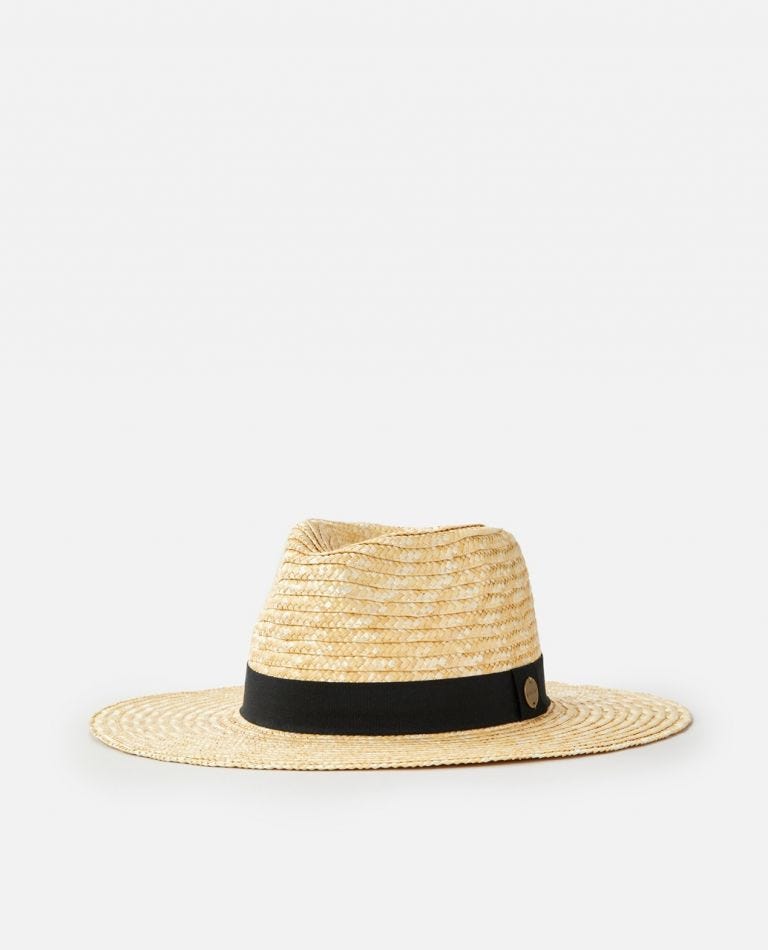 A light brown Rip Curl Sunseeker UPF Sun Hat, crafted from woven straw, featuring a wide brim and a black band above the edge. The hat boasts a slightly indented crown with a small emblem on the band. The plain white background accentuates the hat’s design.
