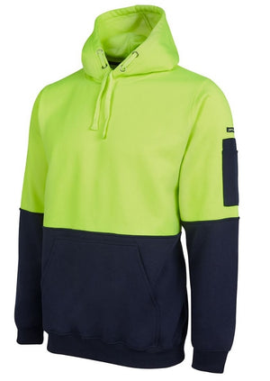 The JBs Hi Vis Pull Over Hoodie is a two-toned design with a bright neon yellow upper half, which includes the hood and sleeves, paired with a dark navy blue lower half encompassing the kangaroo pocket and cuffs. Perfect for workwear, it also includes a handy small zippered pocket on the left sleeve for added convenience.
