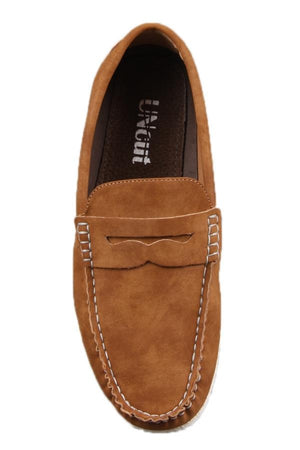 The UNcut Waves Shoe is a single tan suede loafer featuring white stitching around the upper edge and apron. It includes a bow-shaped stitch on the front that enhances its casual look. The interior is brown with visible branding text, available in UK sizing.