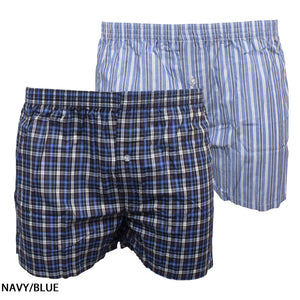 A pair of men's Koala Nitelife Elastic Waist Boxershorts 2 Pack. The pair in the foreground features a navy, white, and light blue plaid pattern with white buttons and an elastic waist for comfort. The pair in the background showcases vertical blue and white stripes with white buttons. The text "NAVY/BLUE" is displayed in the bottom left corner.