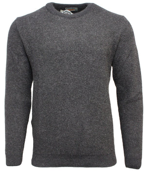 The MKM Adventure Possum Wool Crew Neck Jumper is a plain, gray, knit sweater with long sleeves and a crew neckline displayed on a mannequin. Made in New Zealand, the recycled Possum/Wool blend gives it a casual and cozy appearance with its ribbed texture.