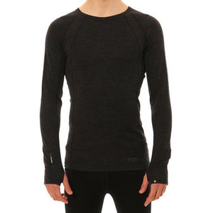 A person is wearing an XTM Merino Long Sleeve Top, a fitted, black thermal top made from Australian Merino Wool. The neckline is round and collarless, providing an odour repellent feature. There are no other visible details or accessories against the plain white background.