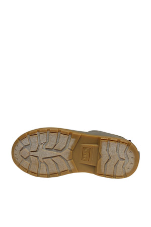 The image displays the sole of the Muck Boot Originals Women's Ankle Boot, highlighting a textured rubber tread for grip. It has an intricate design with various grooves and "Muck" embossed in the center. The boot features a light brown color and antimicrobial footbed for added comfort and freshness.