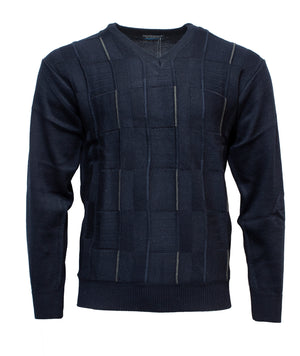 The Ansett Tradewinds Wool Blend Vee Knit is a navy V-neck sweater with textured square and rectangular patterns on the front, rib knit cuffs, and a ribbed waistband, crafted from a cozy acrylic-wool blend.
