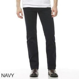 A person wearing a white shirt and navy Riders Straight Moleskin Stretch pants stands with arms relaxed at the sides. The stylish casual pants are straight-cut and paired with dark brown shoes. The word "NAVY" is written in the bottom left corner of the image.