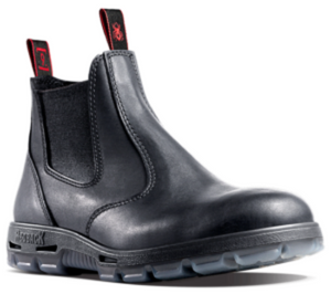 The Redback UBBK Bobcat Soft Toe is a black pull-on work boot with elastic sides and distinctive red pull loops on the front and back. This expertly handmade Australian boot boasts a sleek, durable leather upper and features a rugged sole for reliable traction.