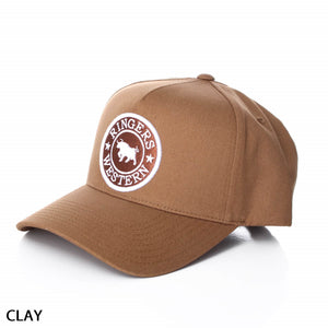 Ringers Western Grover Baseball Cap featuring a white and brown patch with a cattle image and the text "RINGERS WESTERN." The cap, labeled "CLAY" in the bottom-left corner, includes an adjustable strap for a comfortable fit.