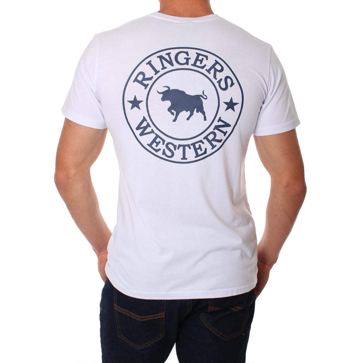 A person facing away from the camera is wearing a Ringers Western Signature Bull Classic T-Shirt, featuring a crew neck design. The back of the white shirt showcases the text "RINGERS WESTERN" surrounding a silhouette of a bull and two stars.