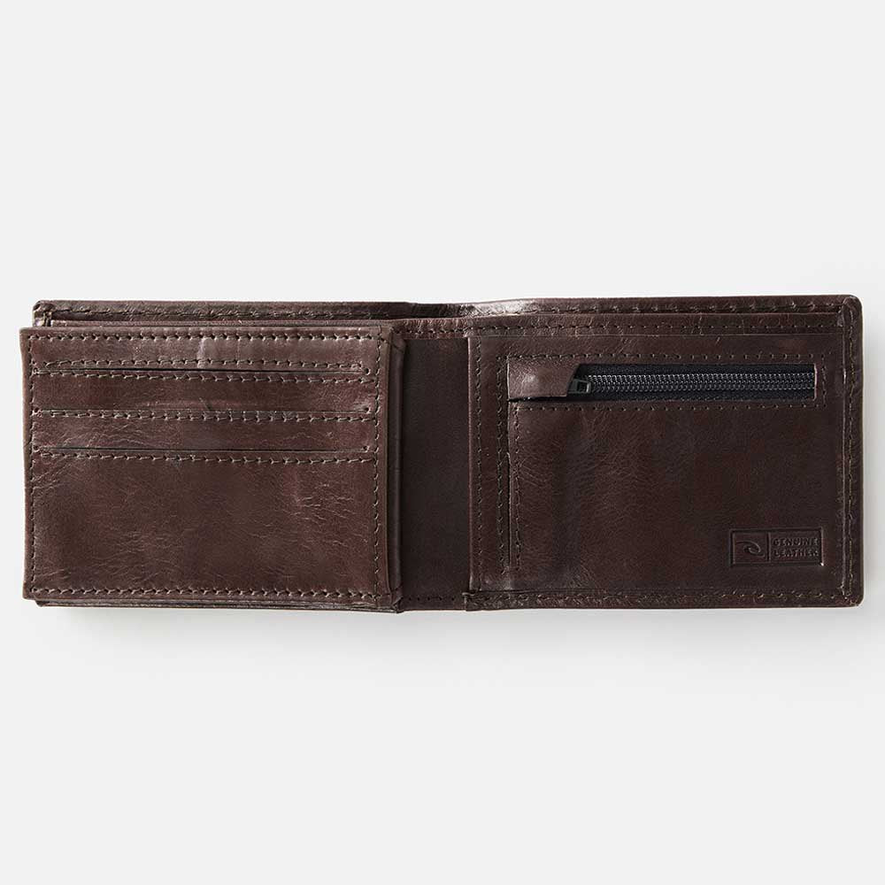 The Rip Curl Perforation RFID Slim Wallet is displayed on a plain white background, featuring an open brown leather design with several card slots and a zippered coin pocket on the right side.