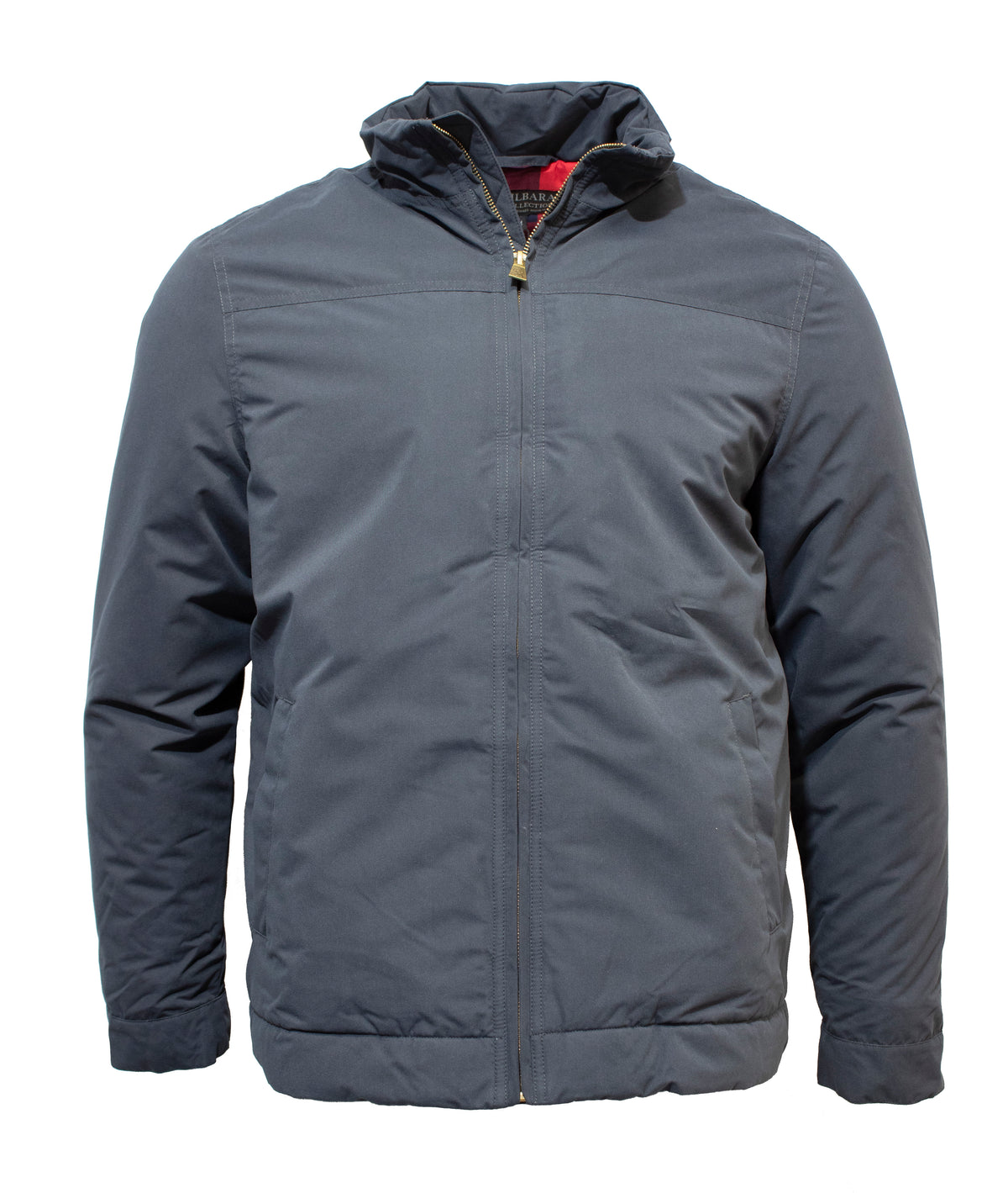 The Pilbara Quilted Jacket is a dark gray, zip-up jacket with long sleeves and a high collar. Classic fit for everyday style, made from a cotton/polyester blend, shown against a plain white background.