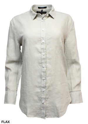 The Ritemate Pilbara Ladies Linen Shirt is a beige, long-sleeve, button-up linen shirt featuring a classic collar. Crafted from lightweight and slightly textured 100% linen fabric, this tailored fit garment includes visible buttons down the front and additional buttons on the cuffs. The text "FLAX" is displayed in the bottom left corner.