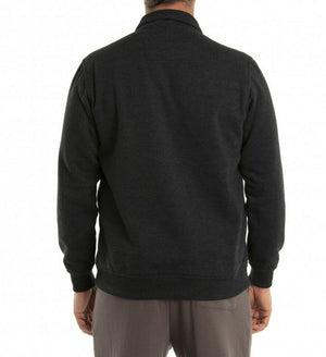 A person facing away from the camera, wearing the Breakaway Dex Snowy Mt Fleece Half Zip and light-colored pants. The background is plain and white, offering no context or further details.