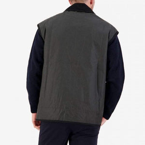 A person faces away, wearing a Swanndri Foxton Vest Wool Lined in dark green over a long-sleeve black sweater, against a plain white background.