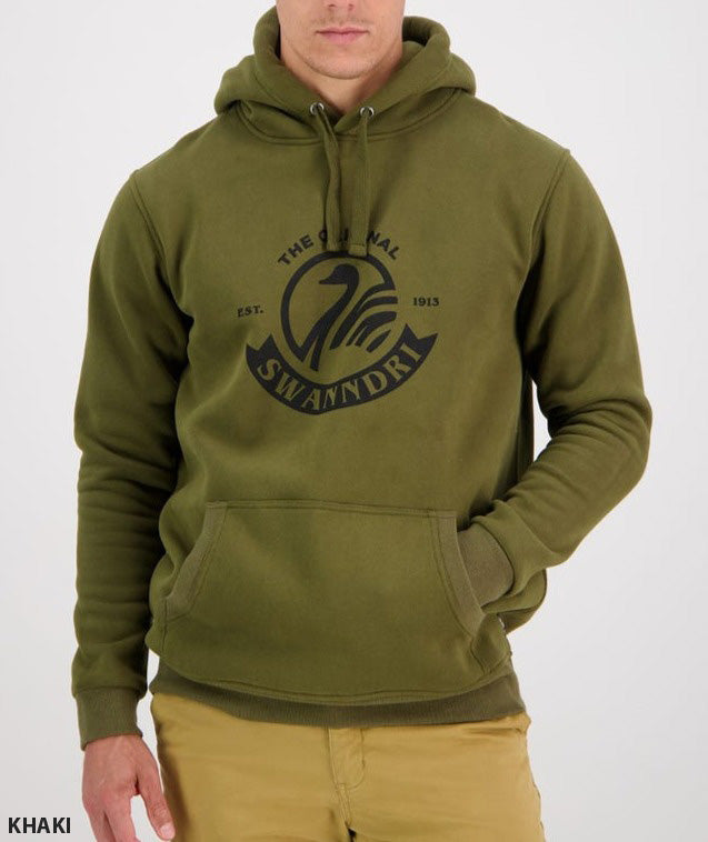 Someone is wearing a comfortable Swanndri Original Fleece Hoody in khaki, featuring the iconic logo and "The Original Established 1913" text. Crafted from loop back fleece, it includes a drawstring and front pocket. They pair it with beige pants, and "KHAKI" appears on the bottom left.