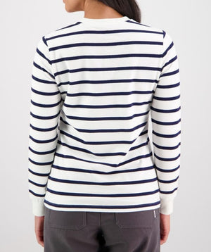 A person is wearing a Swanndri Papamoa Stripe Long Sleeve Tee, featuring horizontal black stripes, and gray heavy-weight fabric pants. They are viewed from the back with hands at their sides against a plain, light-colored background.