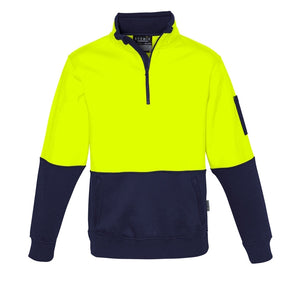 Introducing the Syzmik Hi Vis Half Zip Pullover: a high-visibility work jumper featuring a bright yellow upper and dark navy blue lower section, sleeves, and collar. Made from comfortable polyester/cotton fleece, it includes ribbed cuffs and hem along with a handy pocket on the left sleeve.
