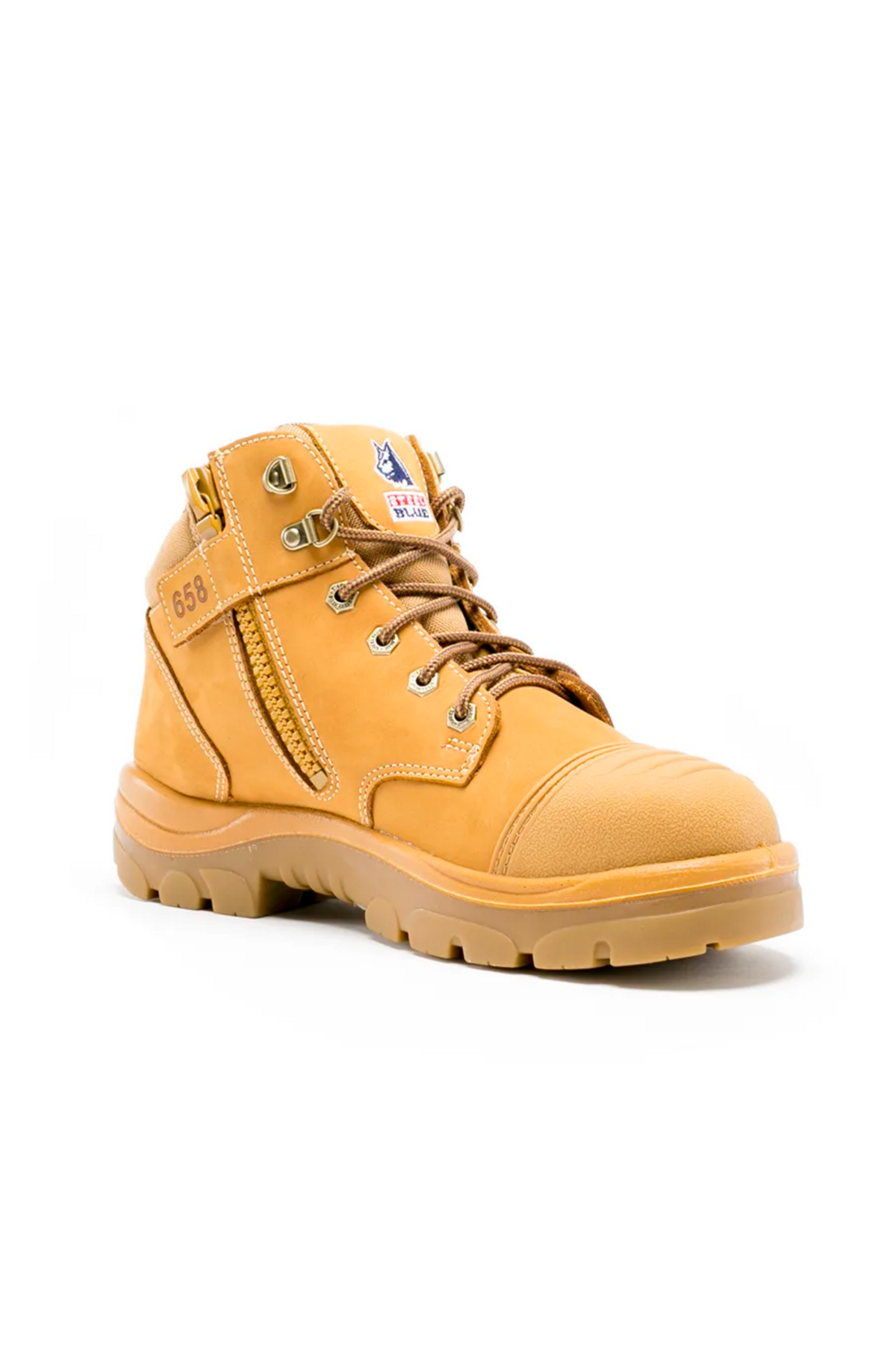 The Steel Blue Parkes Zip Scuff Cap Boot is a tan work boot featuring a rugged sole, zip closures on the side, and a safety steel toe. It also includes laces with metallic eyelets. The boot is adorned with the number "658" and an emblem displaying "USA" and an American flag near the top side.