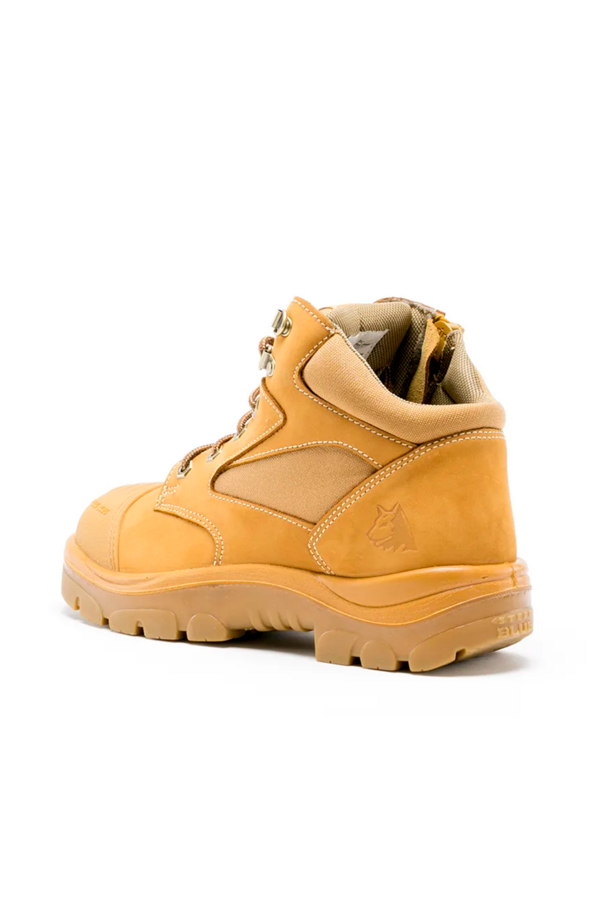 A single Steel Blue Parkes Zip Scuff Cap Boot in tan is shown, angled to display the side and back. The boot features a high ankle, laces, and a rugged sole. A logo with a wolf head is embossed near the heel. Constructed from water-resistant leather, its interior is padded for comfort.