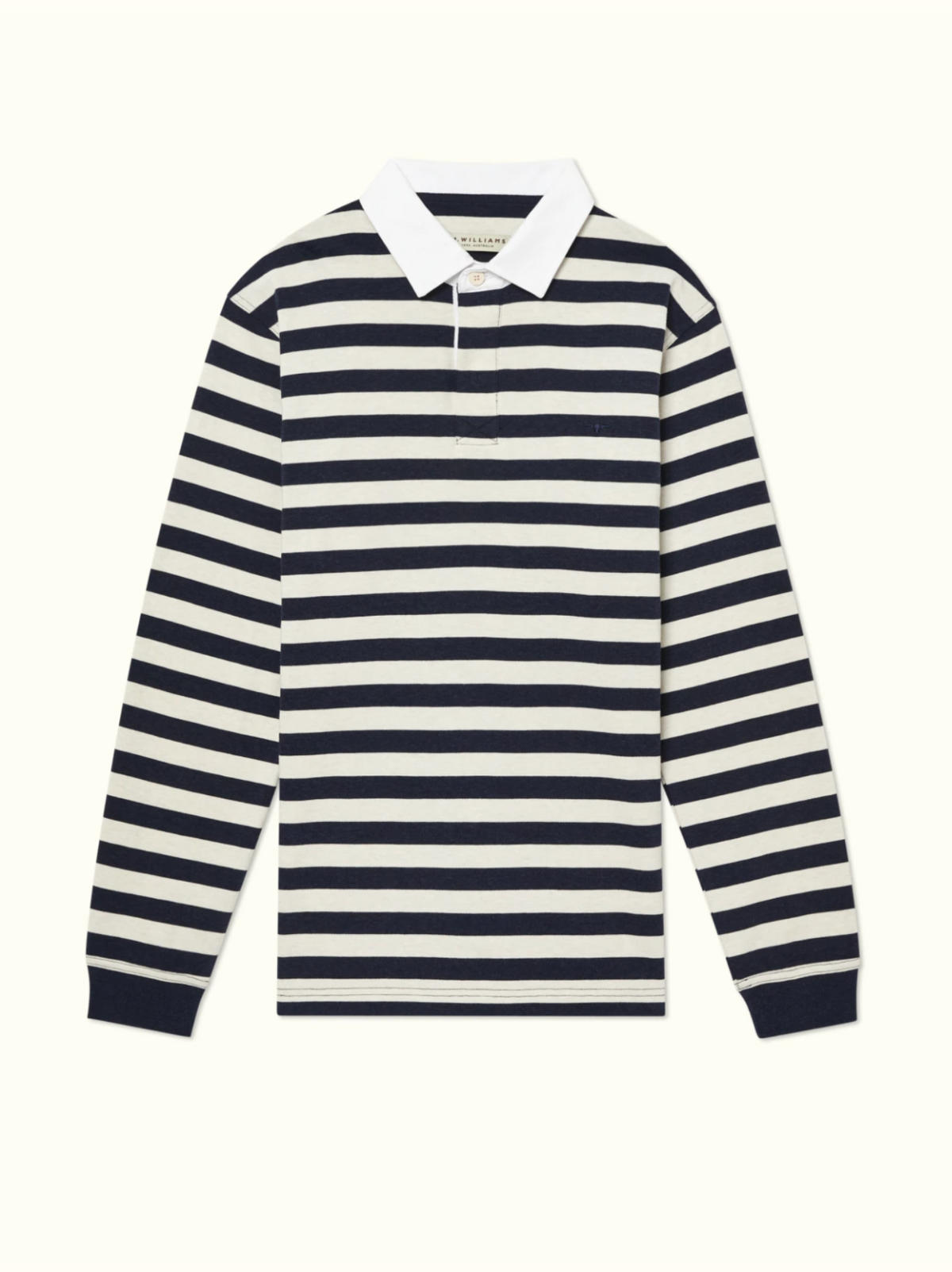 The RM Williams Tweedale Rugby is a heavyweight jersey knit shirt with horizontal black and white stripes, a cotton twill collar, and black cuffs, shown laid flat on a light background.