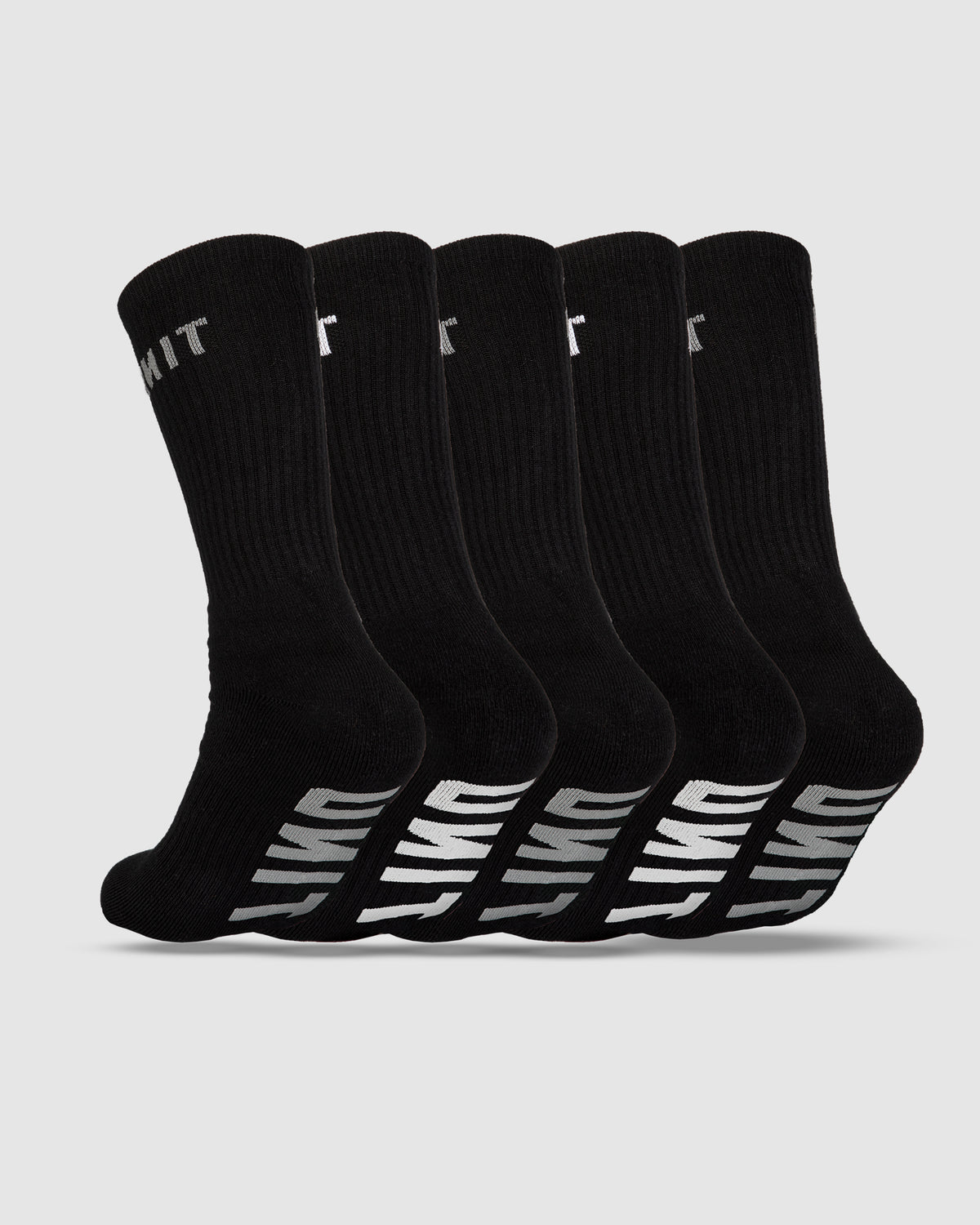 The UNIT Respond Bamboo 5 Pack Socks are displayed diagonally against a plain background. Each black sock has a ribbed texture, "LIMIT" written in white on the top, and a white design on the sole.