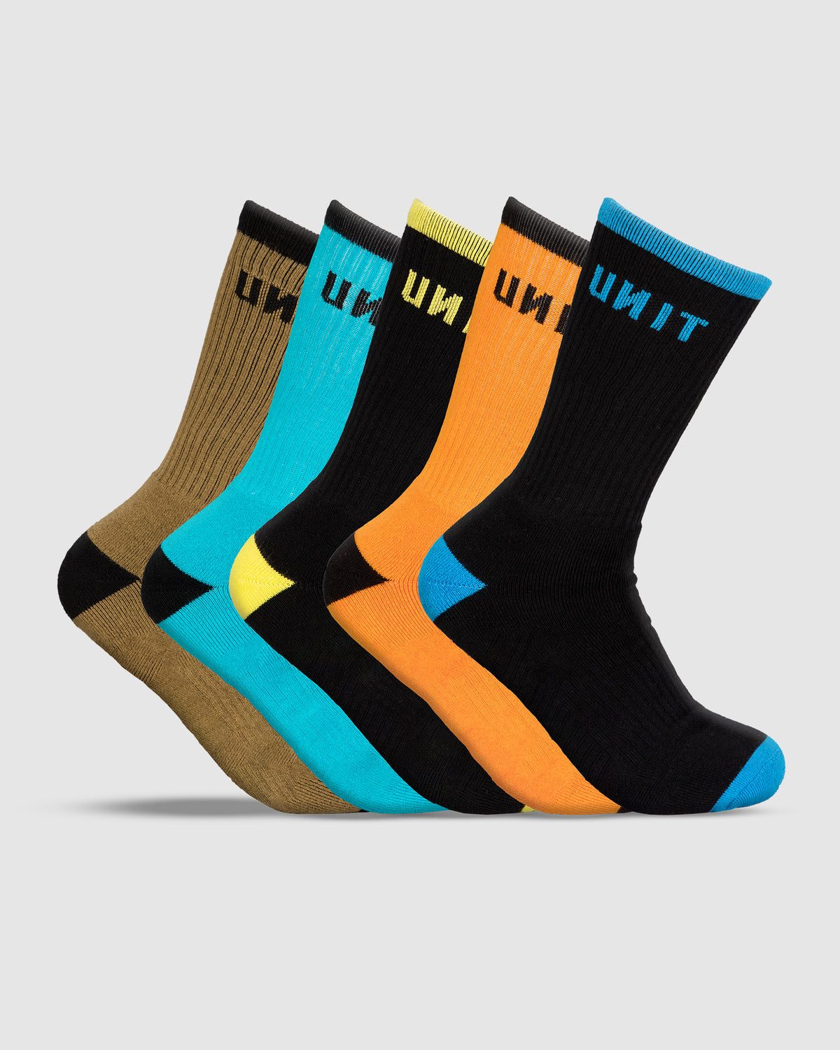 The UNIT React Bamboo 5 Pack Socks include five anti-bacterial crew socks in brown, turquoise, yellow, orange, and black with contrasting heel and toe plus the UNIT logo—offering comfort and vibrant style for everyday wear.