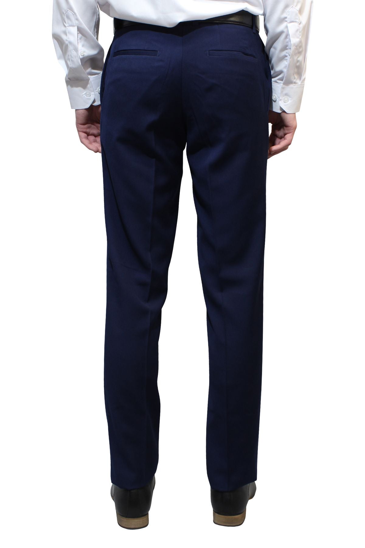 A person stands with their back to the camera against a white background, wearing a white dress shirt, Bruton Jesse Trouser in dark blue with hip pockets (slim fit), and black shoes.