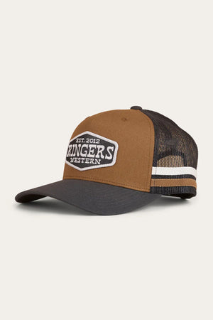 The Ringers Western Banks Trucker Cap features a brown and black design, curved brim, white and black side stripes, front patch reading "EST. 2012 RINGERS WESTERN," black mesh back panel, and adjustable snapback closure.